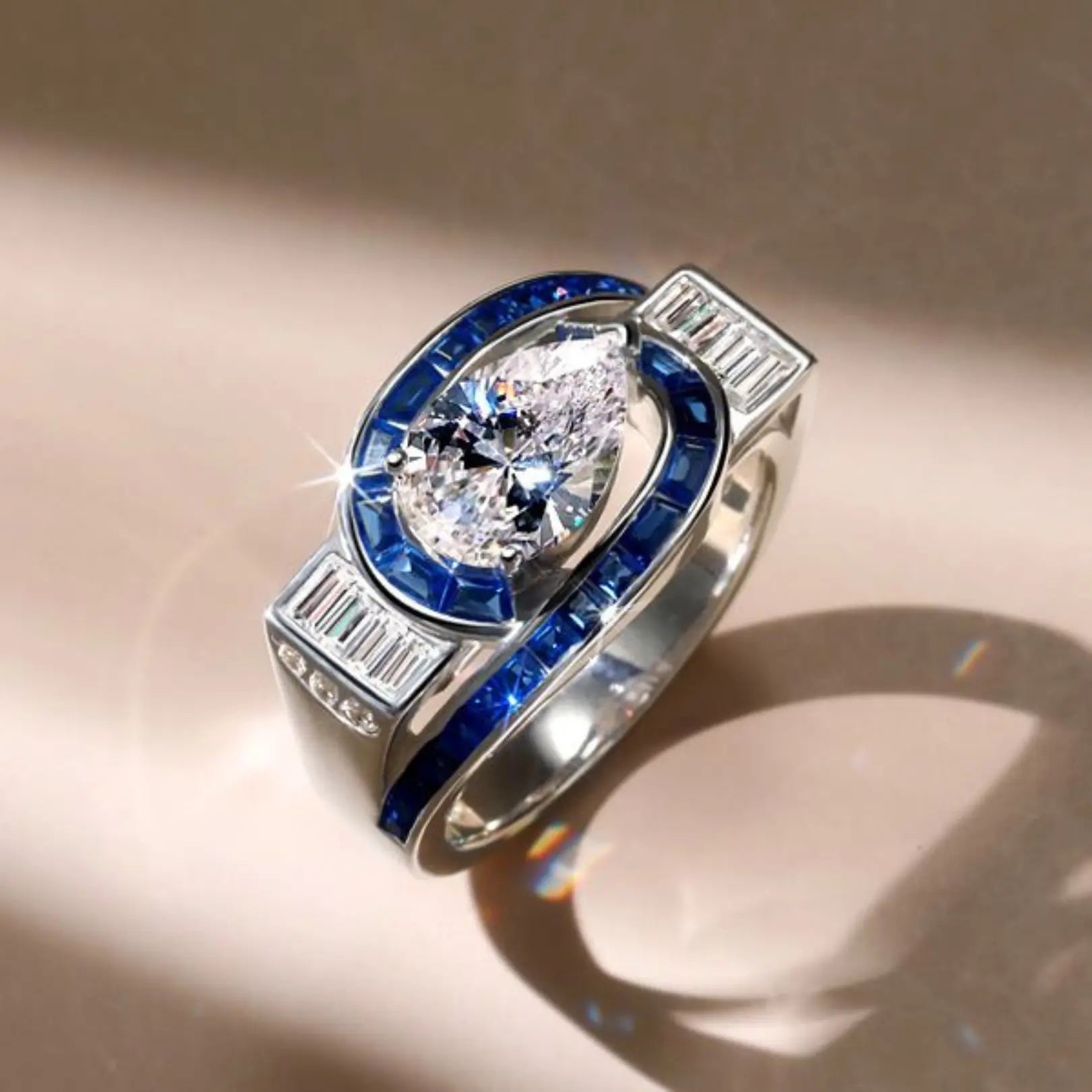 Art Deco Pear Shaped Blue Sapphire Engagement Ring