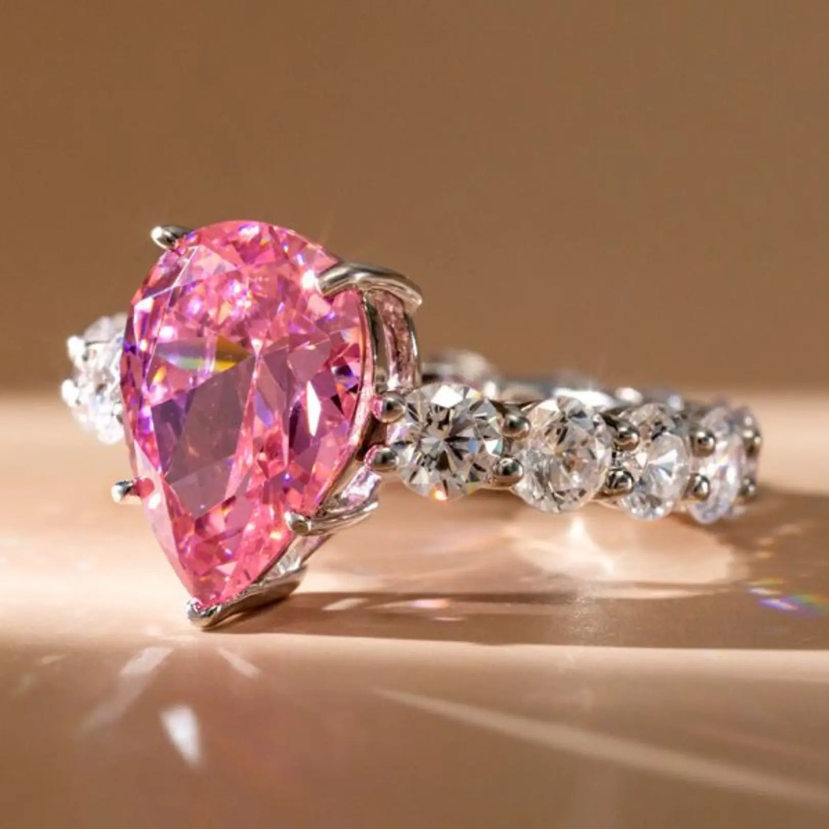 Pink Stone Pear Shaped Engagement Ring