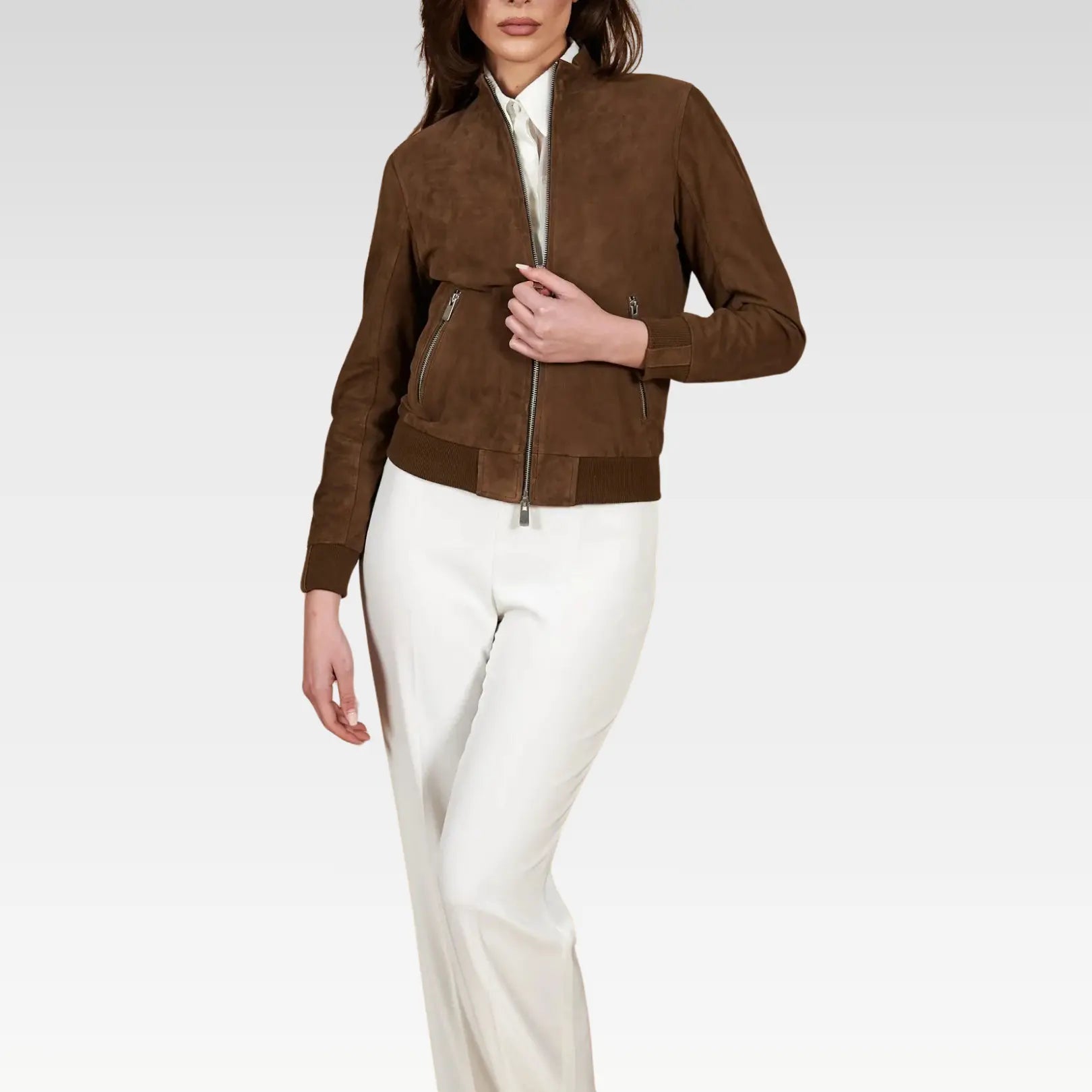 Brown suede jacket worn by a person on a white background