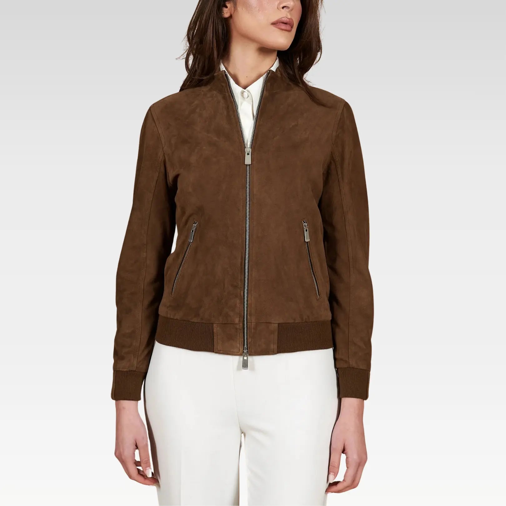 Brown suede jacket worn by a person on a white background