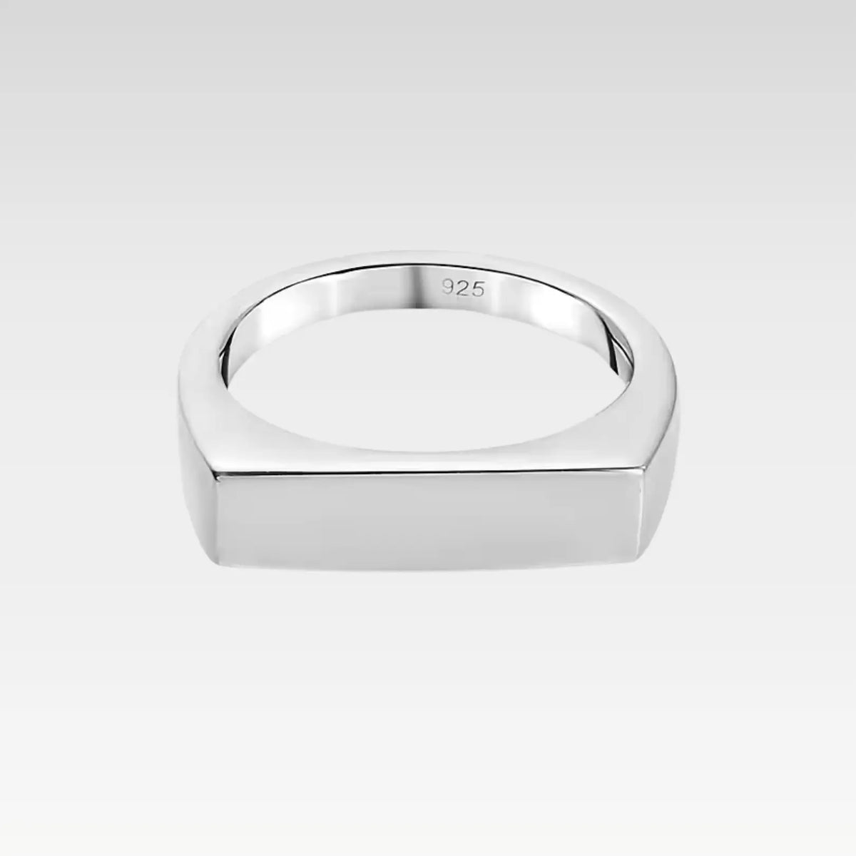 High-polish silver signet ring featuring an angular, flat rectangular top for a sleek silhouette