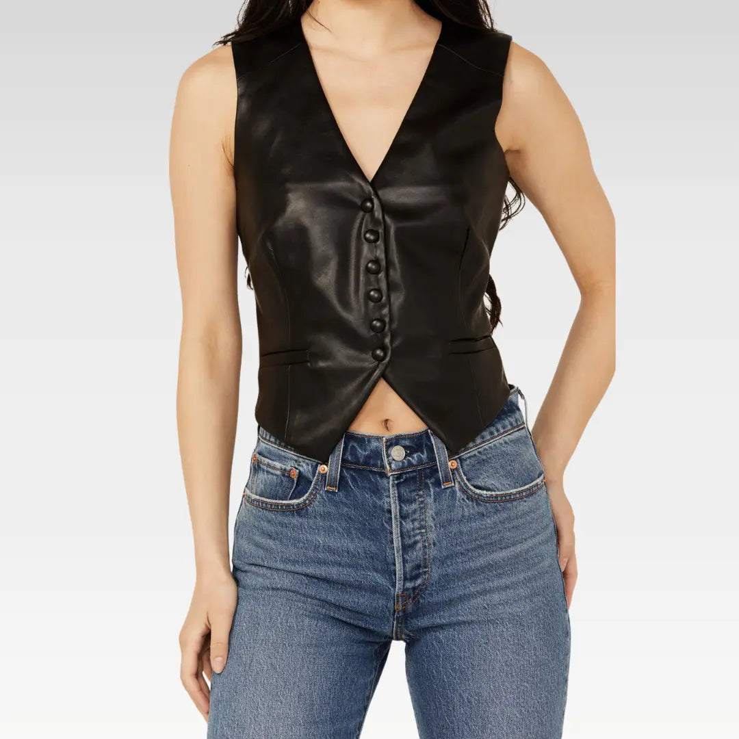 Full front view of the black lambskin leather vest styled with jeans, showcasing button-down structure.
