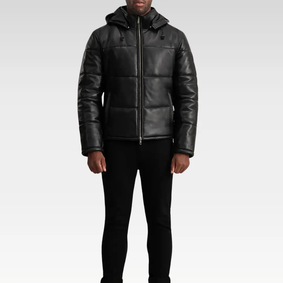 Front view of the Gordon Black Hooded Leather Puffer Jacket zipped up, featuring dual pockets and a clean, fitted silhouette.