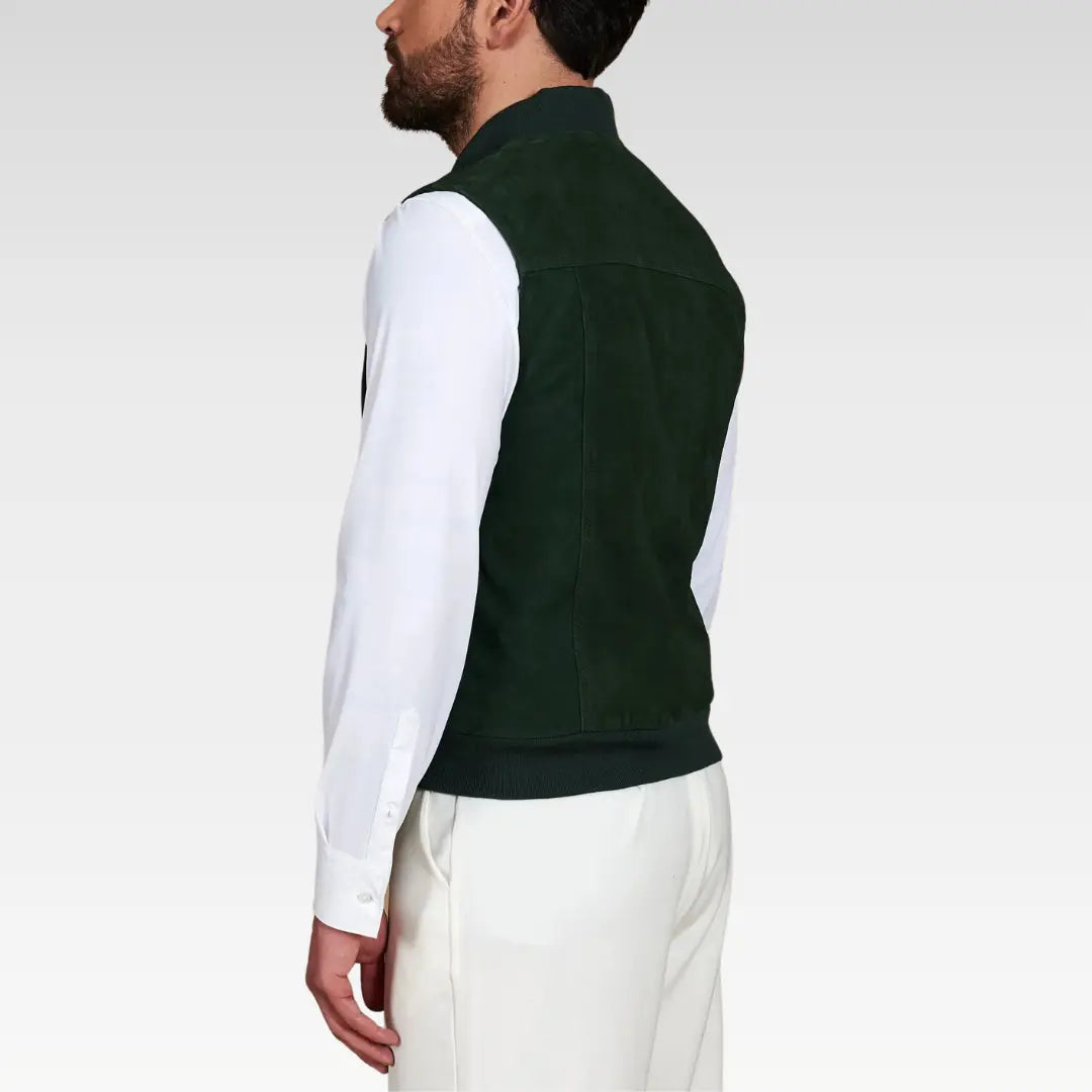 Left profile view of green suede vest with snug fit and white shirt pairing.