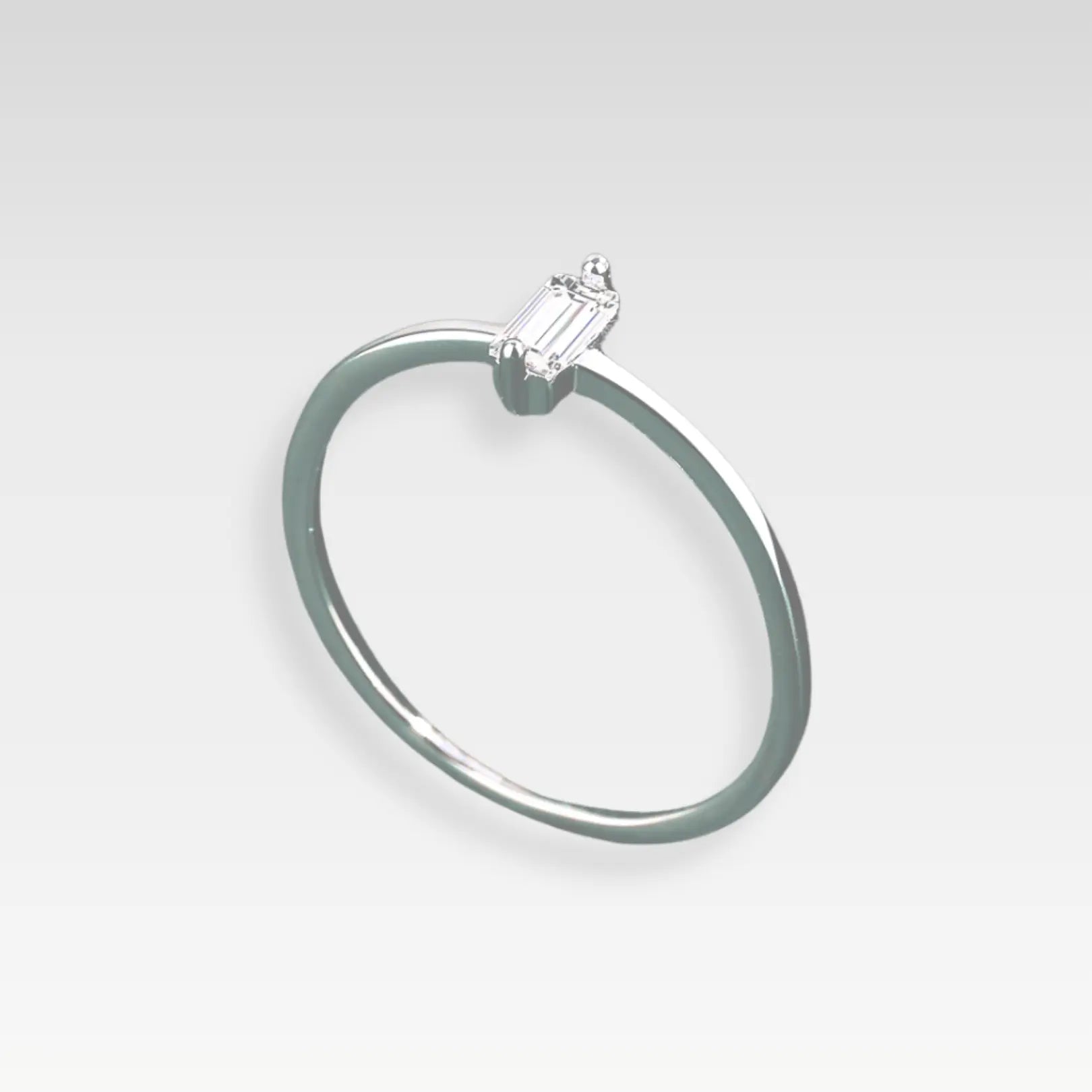  Subtle and stylish zircon ring made with polished silver, ideal for minimalist looks.