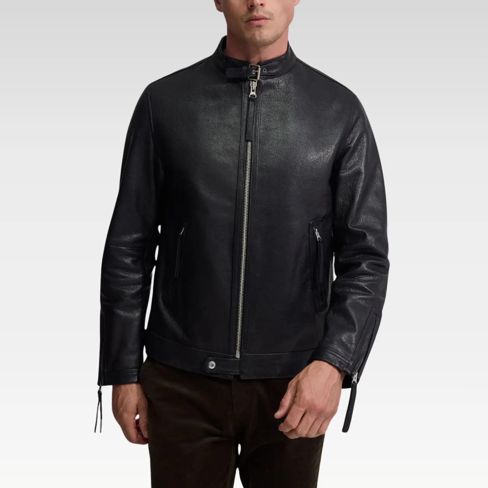 Front view of Oryn biker leather jacket in sleek black leather with metallic zips and practical side pockets.