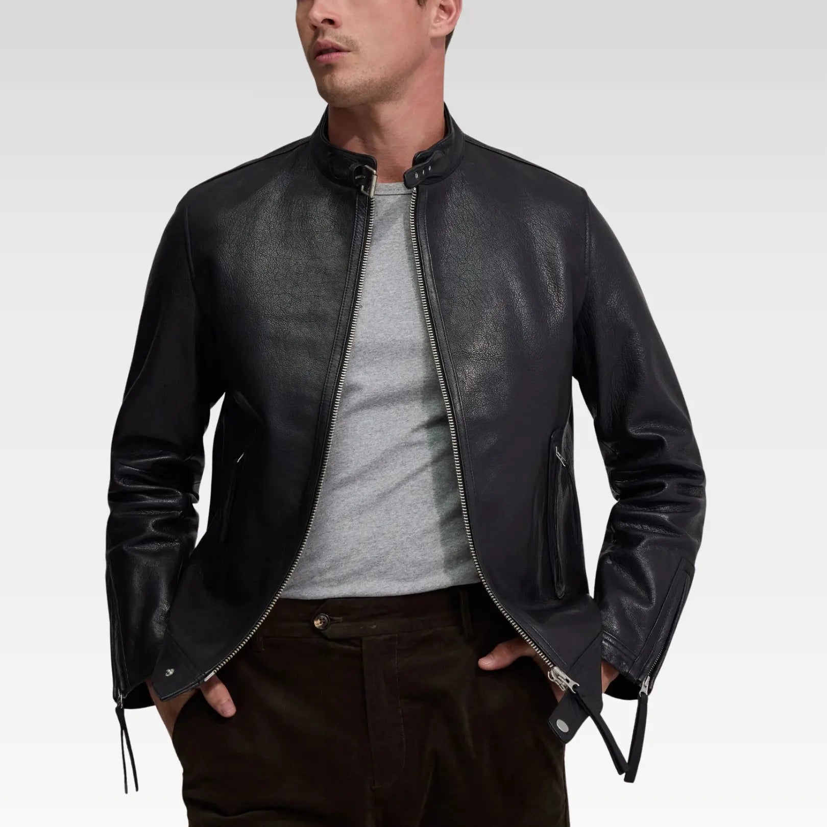 Oryn biker leather jacket styled with grey T-shirt, showcasing versatile layering and all-day comfort.