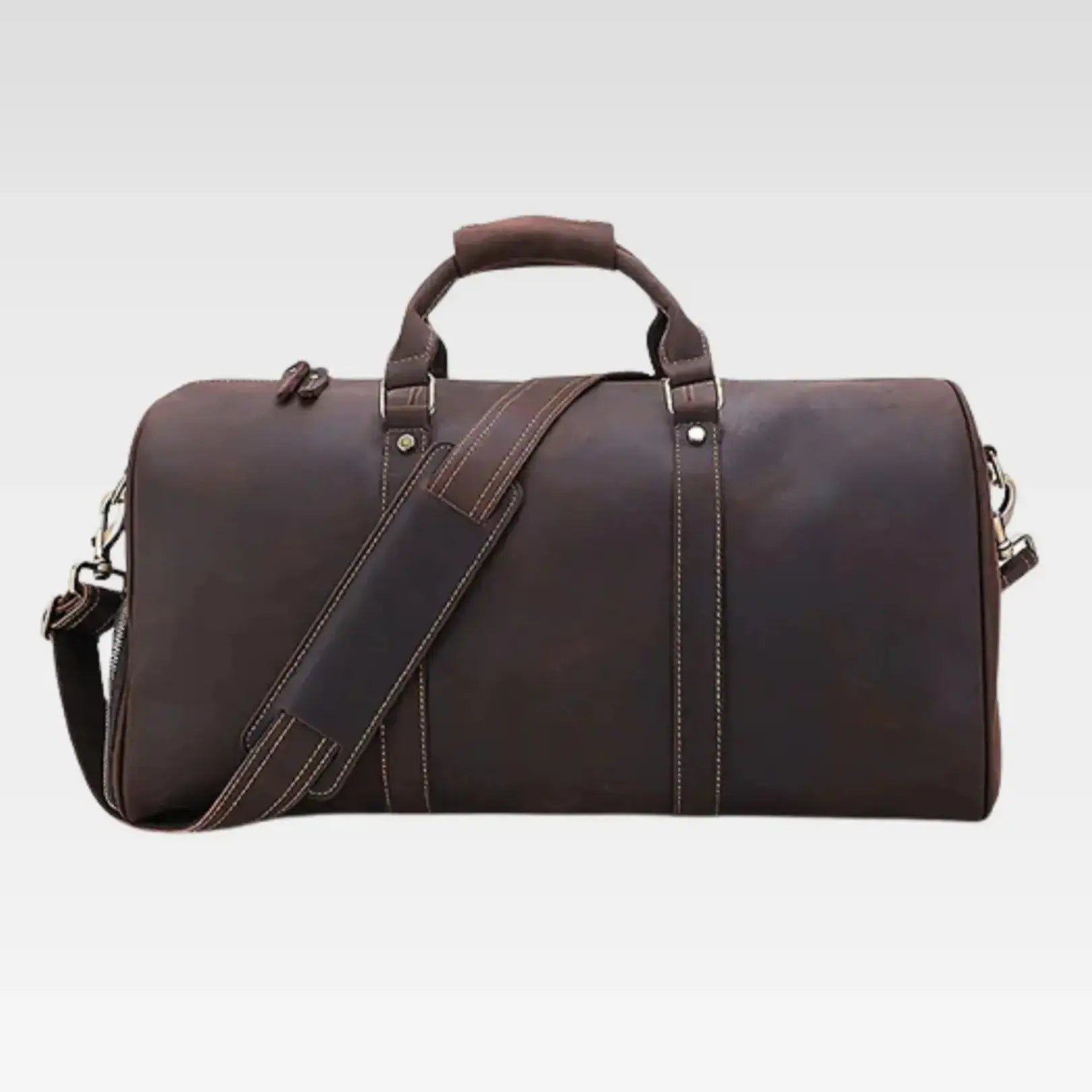 Front-facing view of the Polo Medium matt brown Italian leather duffle bag with sleek minimalist design.