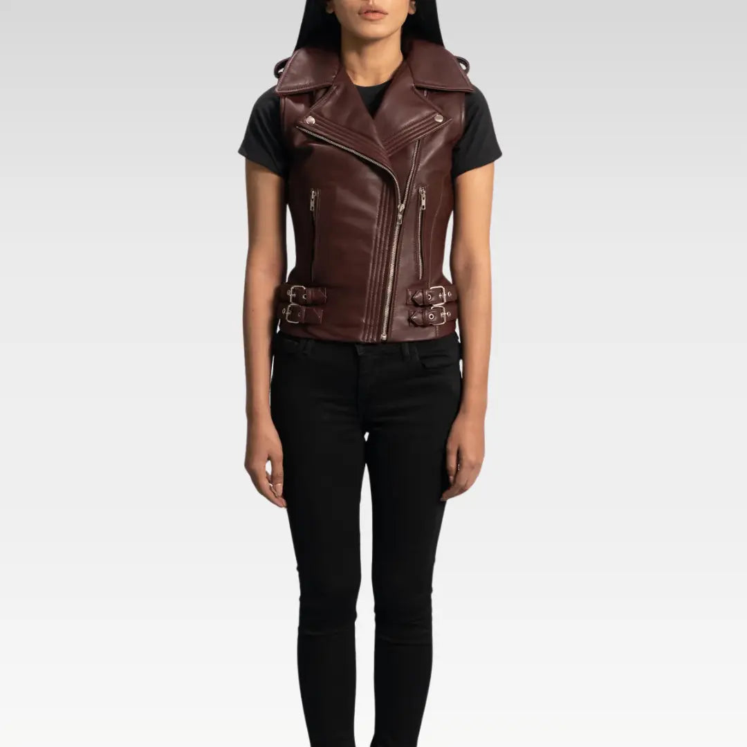 Woman modeling maroon leather biker vest in a three-quarter angle, showcasing overall fit and design
