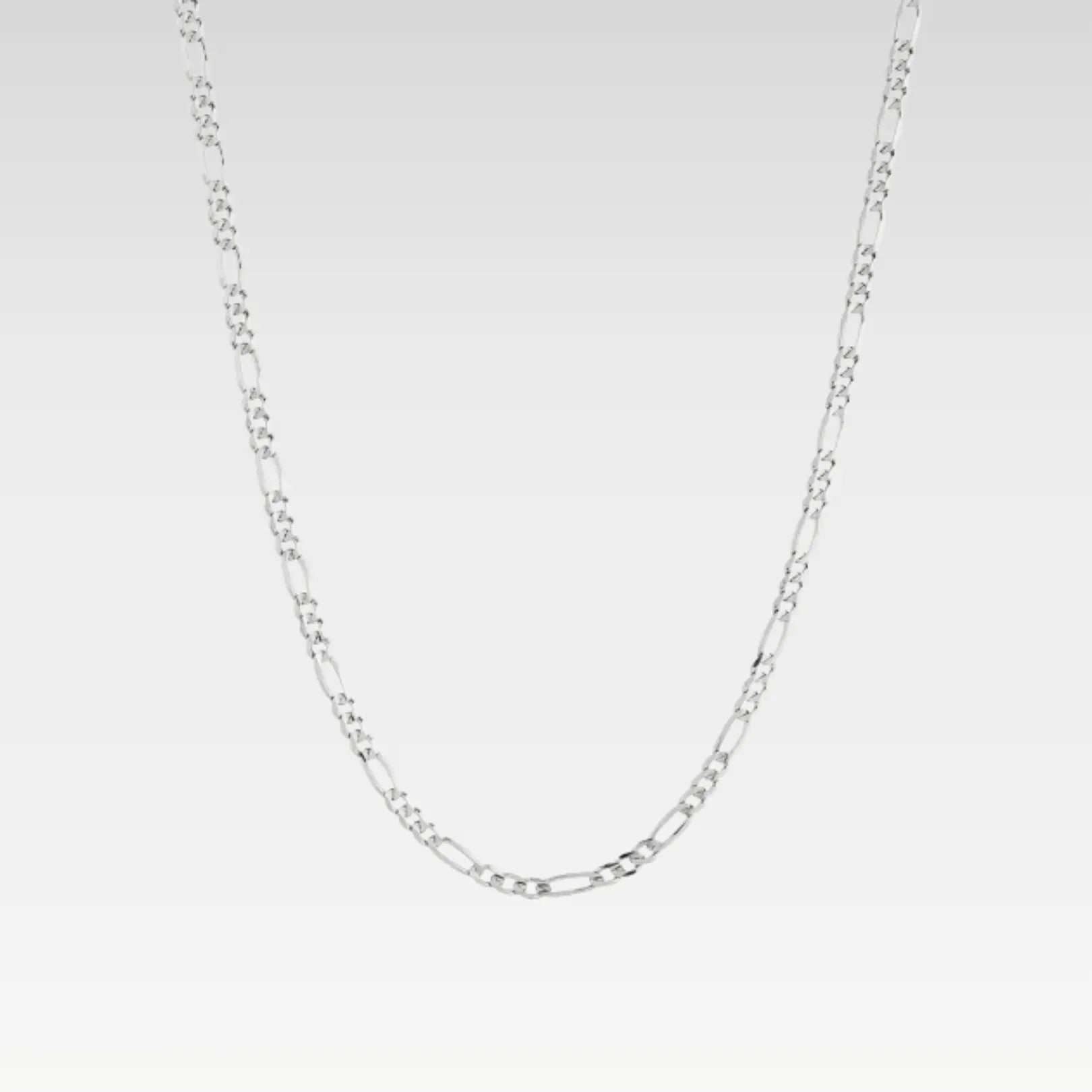  Sterling silver Figaro chain necklace laid flat to showcase the classic, timeless link pattern and polished shine