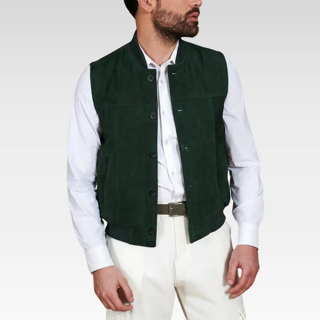 Full front view of men’s button-up suede vest in green, styled casually with white trousers.