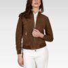 Woman wearing a brown suede jacket on a white background