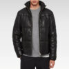 Amine Black Puffer Leather Jacket styled open over a grey shirt, highlighting the inner lining and streetwear-inspired design.