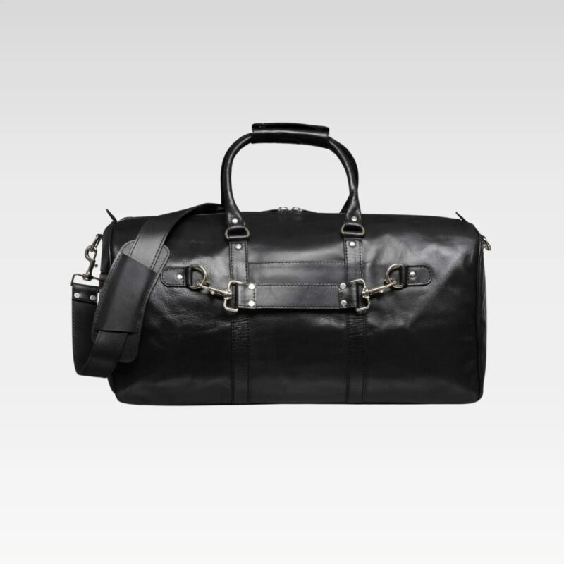 Front view of Apex leather duffel bag showing premium full-grain leather, sturdy handles, and organized front pocket layout.