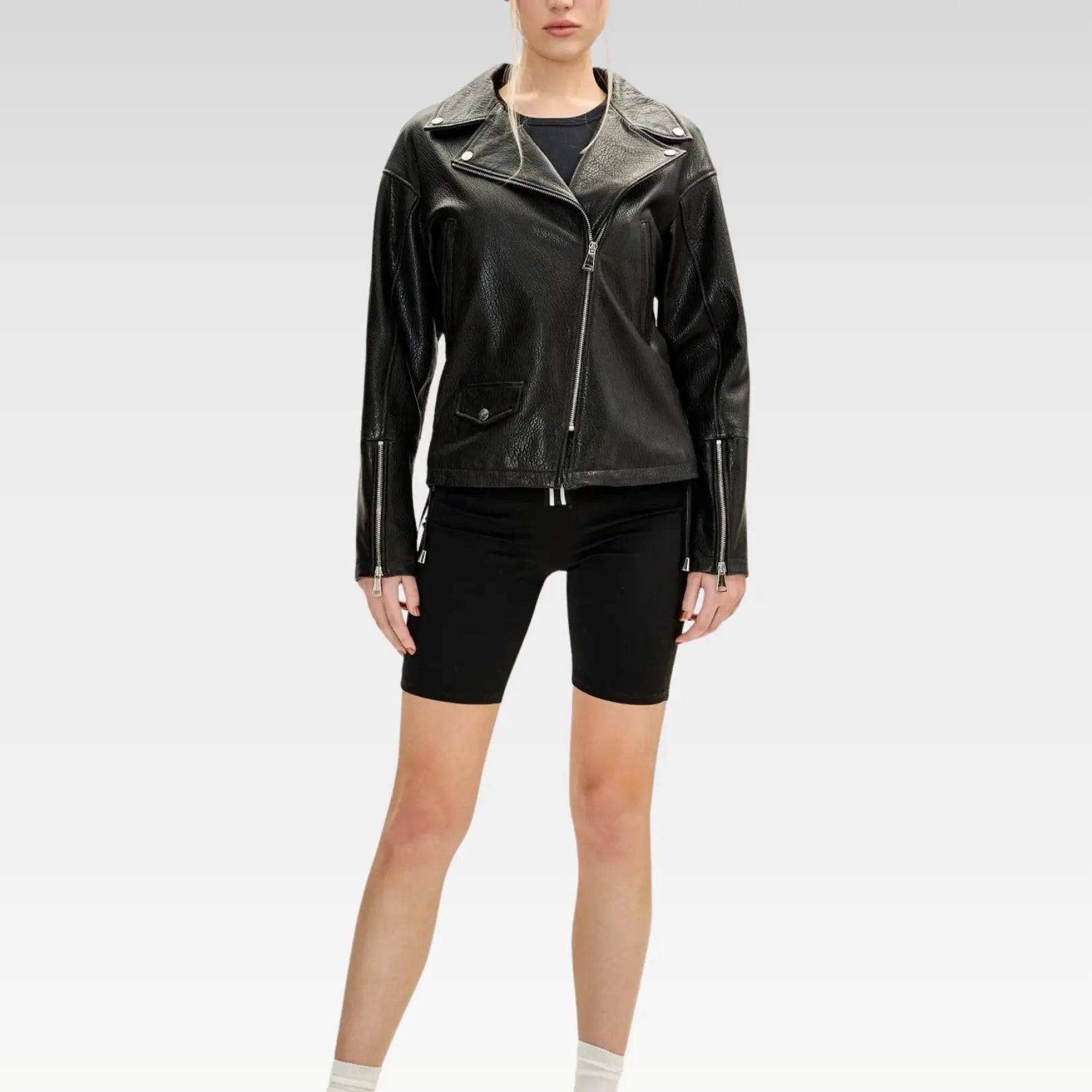 Back view of black lambskin leather biker jacket displaying elastic back detail for perfect fit and premium pebbled leather texture