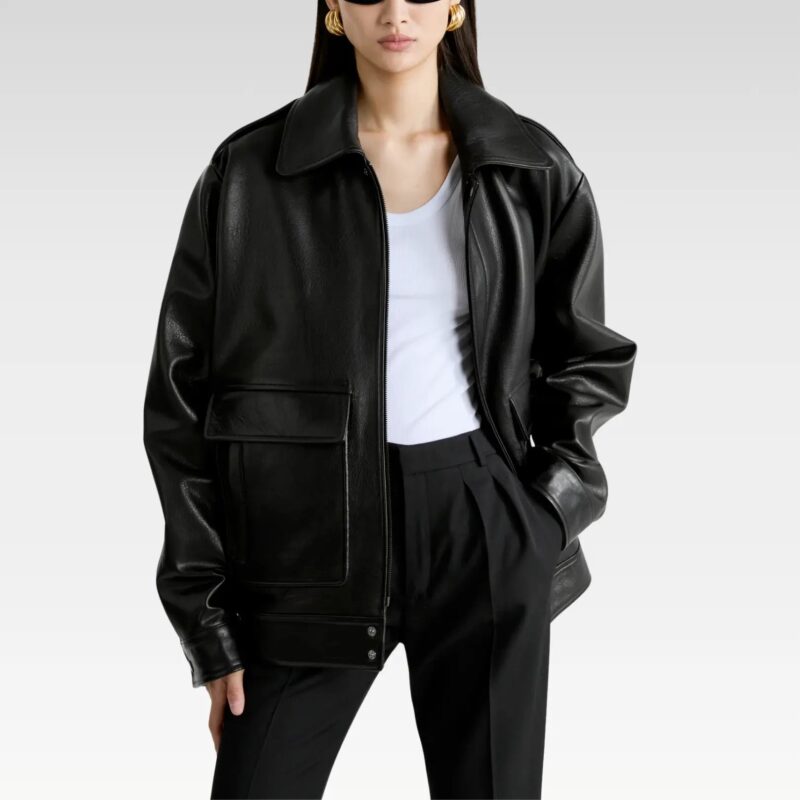 Woman styling black leather utility blazer jacket layered over casual wear, demonstrating versatile day-to-night fashion versatility