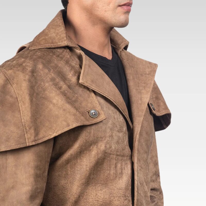 Close-up of Deux brown suede duster highlighting soft suede finish and shoulder flap design