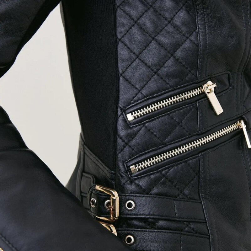 Close-up of the Diamond quilted leather moto jacket highlighting the polished metallic zippers and premium leather texture.