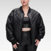 Front view of the Eira Black Leather Quilted Bomber Jacket with arms down, highlighting the rib-knit details and quilted design.