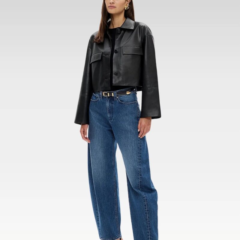 Model wearing cropped leather-look button jacket with flap pockets and relaxed drop shoulders, front view