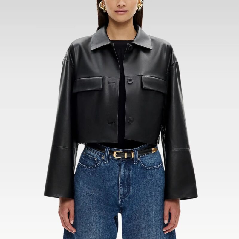 Cropped leather-look button jacket styled with blue jeans, showing flap pockets and sleek finish, front waist-level view