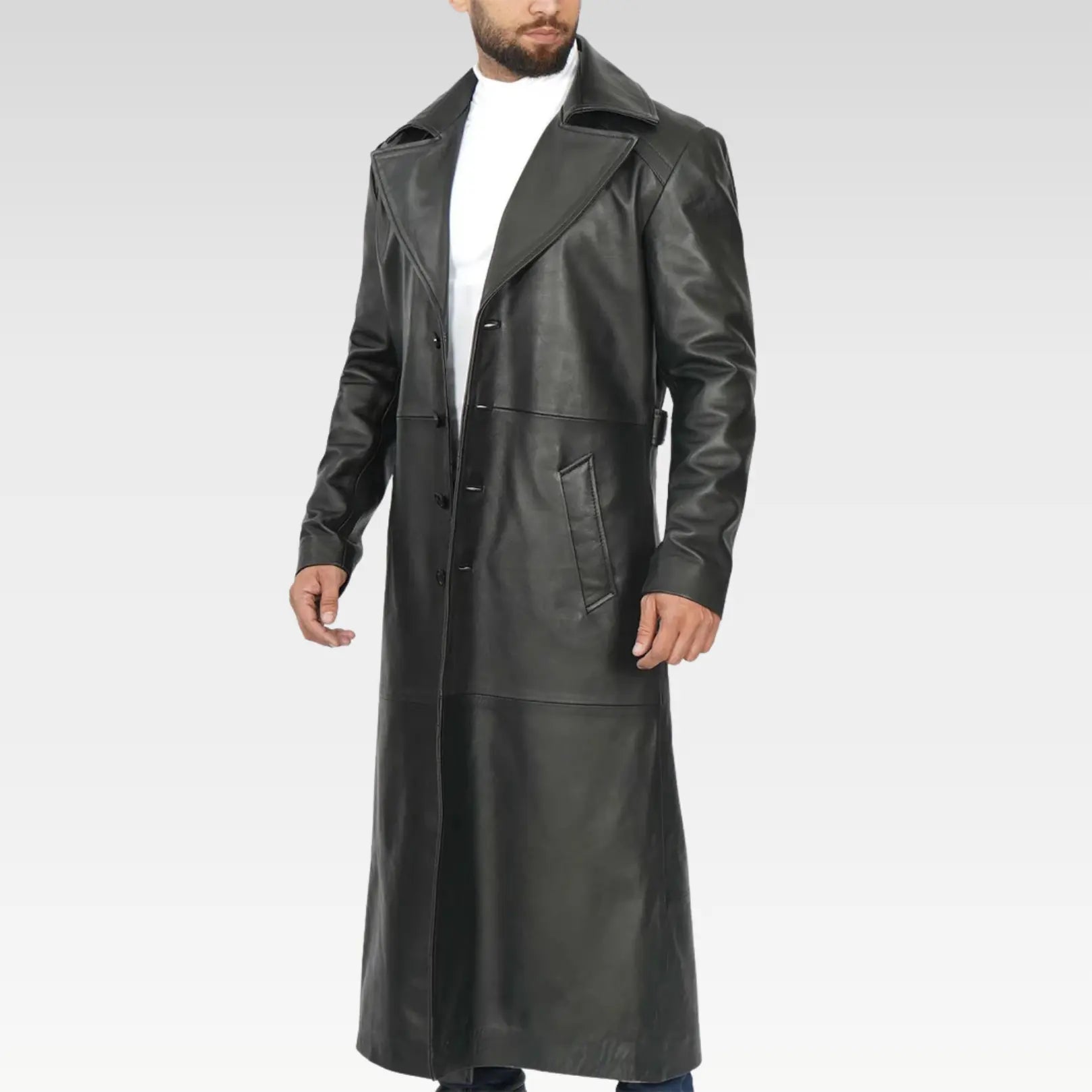 Side front view of Jackson men’s black leather long duster coat with button closure and sleek finish.