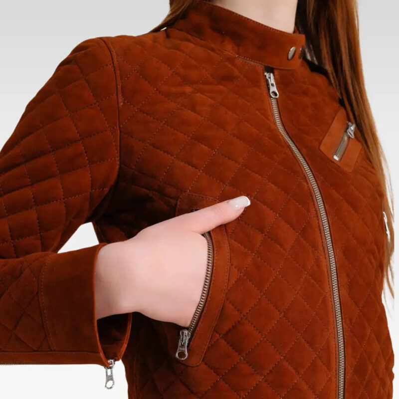 Close-up of the Kael Quilted Sheepskin Suede Leather Jacket highlighting the soft suede texture, quilting, and zippered pocket detail.