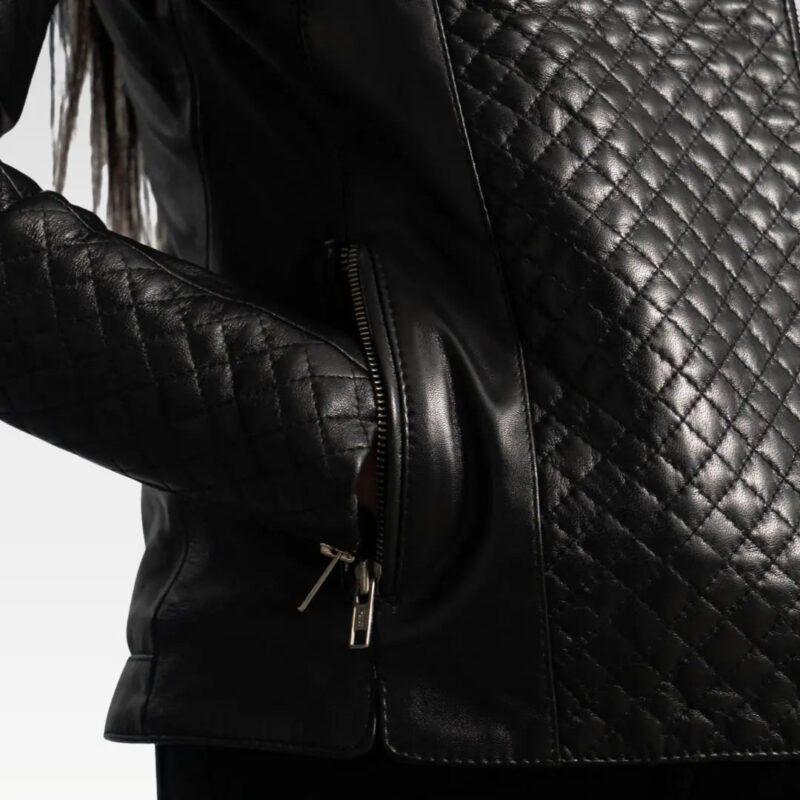 Close-up of the Orient Grain Quilted Black Leather Biker Jacket showing premium sheepskin leather texture and stitching details.