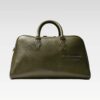 Studio shot of the Sable duffle bag in green, featuring full-grain leather, black-nickel hardware, and travel-ready design.