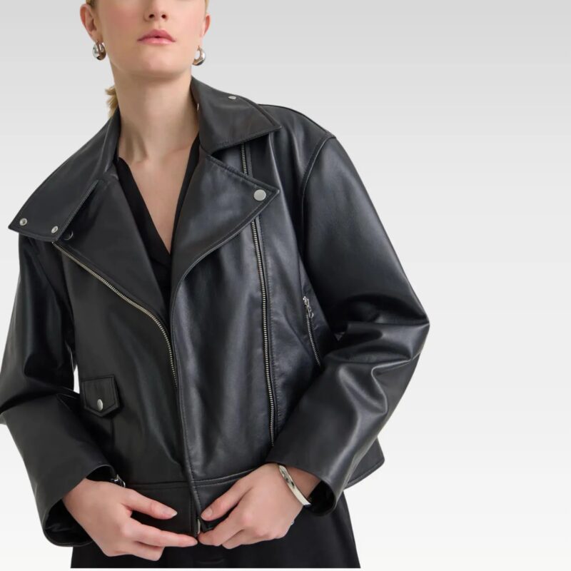 Close-up of the Sasha biker black leather jacket fully fastened, emphasizing the structured boxy cut, luxe leather texture, and biker-inspired details.