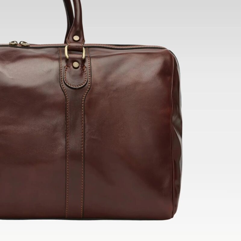 Front view of Stratos brown leather duffle cabin bag showcasing premium leather finish and elegant travel silhouette