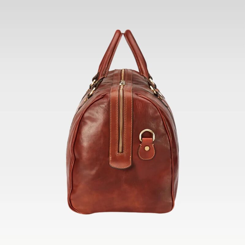 Side profile of the Stratos Wanderer leather duffel showing the streamlined shape, stitching, and hardware details