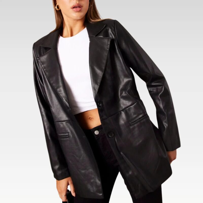 Stylish black leather jacket with a collared neckline, oversized fit, and cozy lining, ideal for adding sophistication to casual outfits.