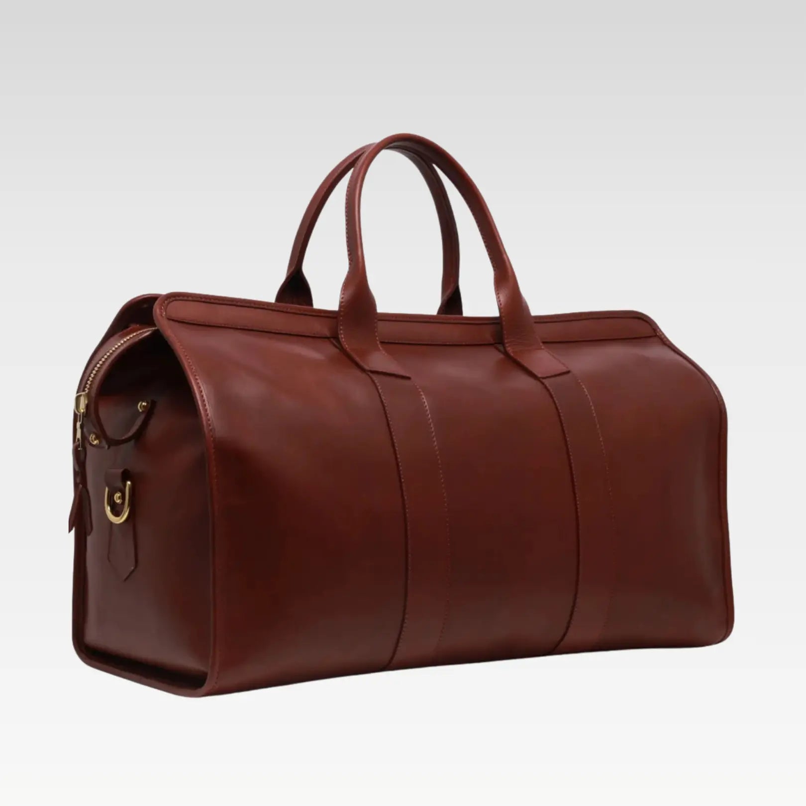 Front view of the Valor Signature Travel Duffle featuring rolled handles, rich brown leather, and classic design, perfect for weekend trips.