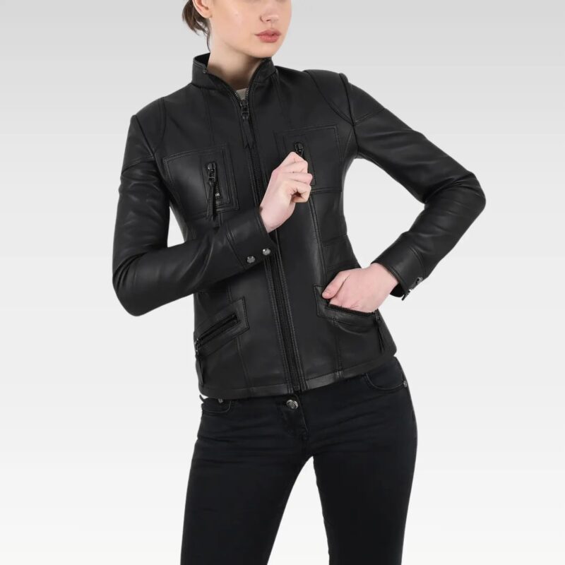 Side profile of a model in a women's black leather bomber jacket highlighting the tailored fit and versatile styling.