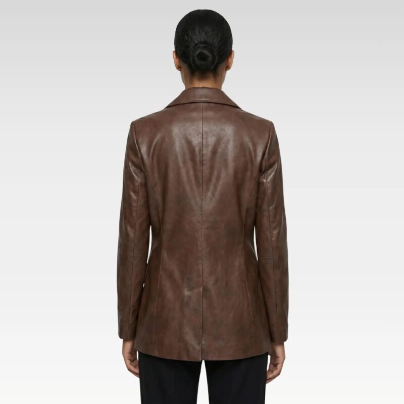 Back view of women’s cognac leather blazer showing clean seams and tailored silhouette