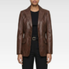 Front view of tailored cognac leather blazer with two-button closure and structured fit