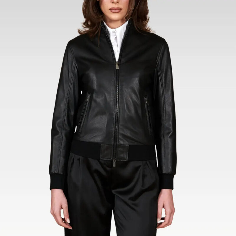 Women's cropped washed leather bomber jacket in black, full pose view with a flattering waist-length fit, perfect for versatile styling with skirts or dresses.