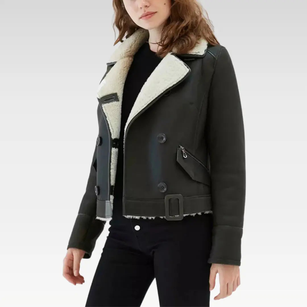 Women's matte black faux shearling aviator jacket angled view featuring the zip-up front, two outer zip pockets, and one interior pocket for functional style