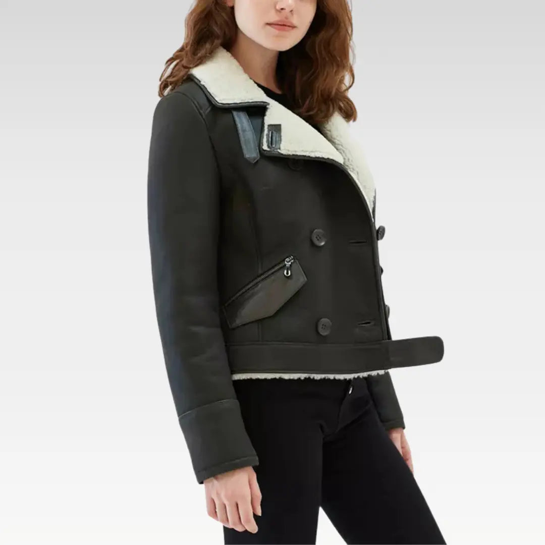 Women's matte black faux shearling aviator jacket side view displaying the tailored silhouette and classic aviator details with a plush faux fur lining.