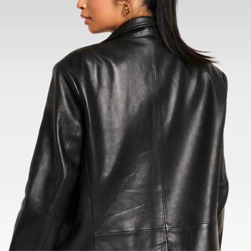 Back view of women’s oversized leather blazer made from lightweight sheep leather, showcasing the relaxed unisex fit and smooth black finish