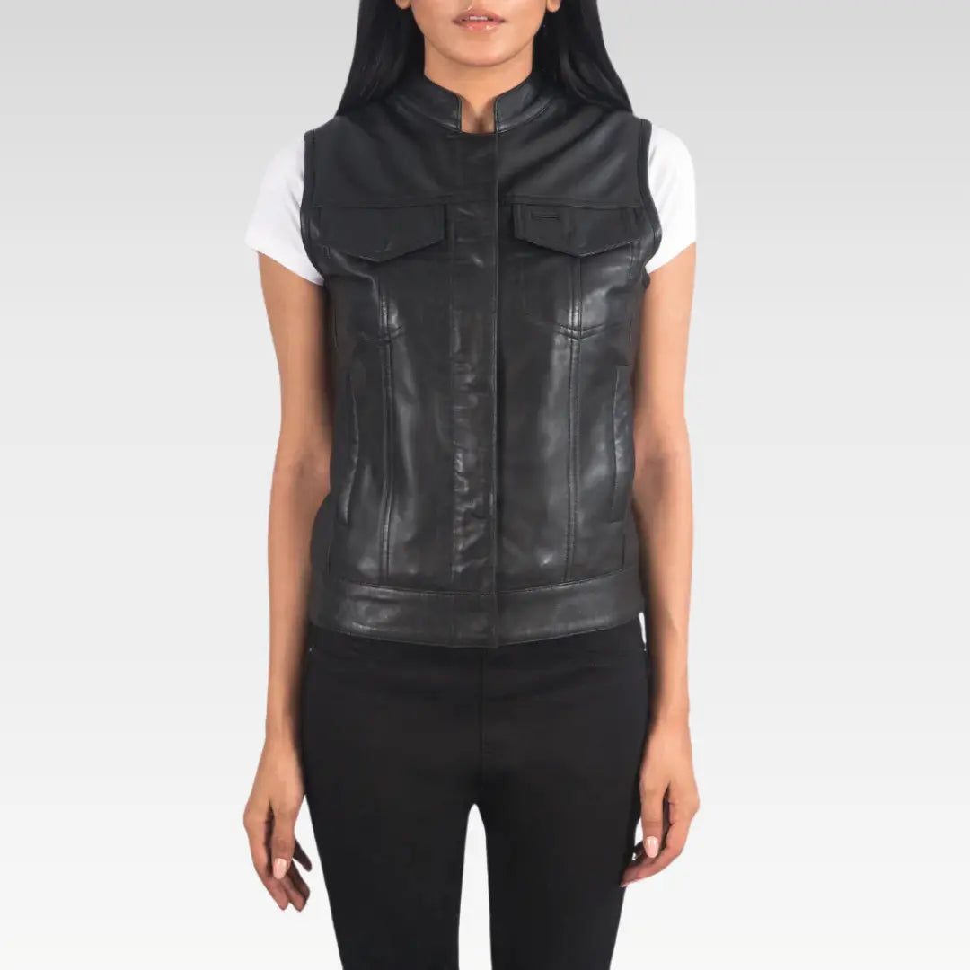 Front view of zipped women's black leather biker vest featuring structured design and sleek finish.