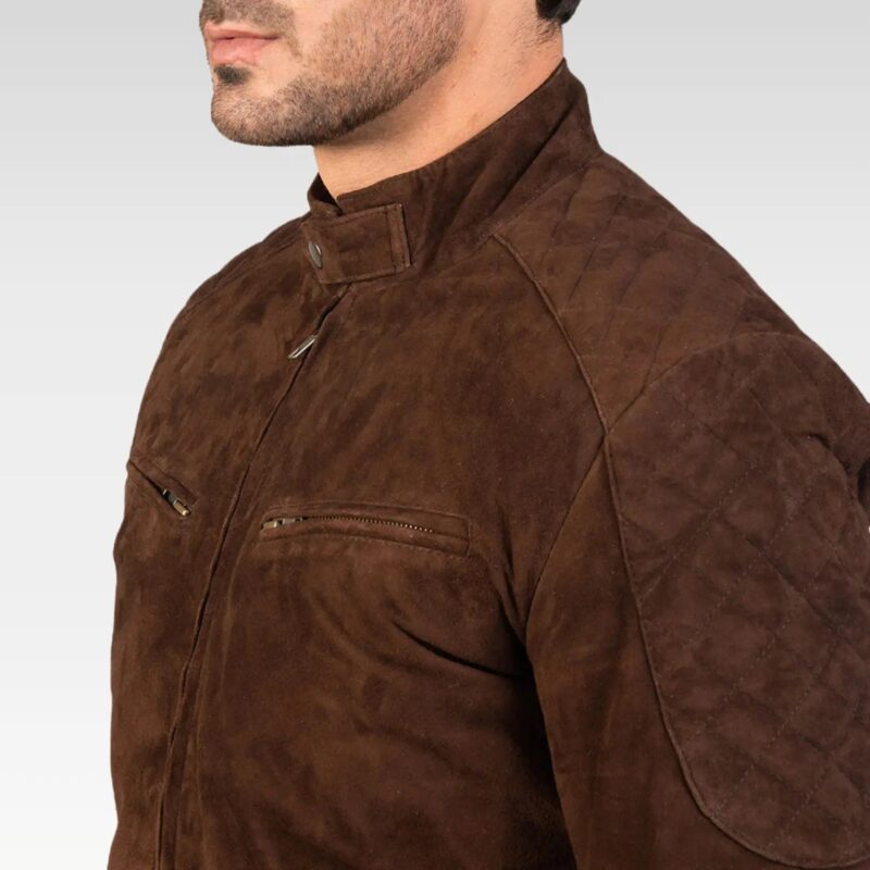 Side close-up of Zenith Mocha Suede Bomber Jacket showing the premium goatskin suede texture, quilted lining, and tailored fit on the model.